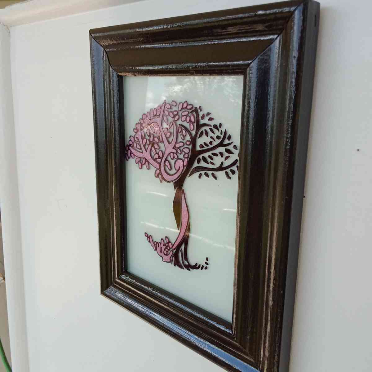 Elegant hand painted on glass picture in a frame