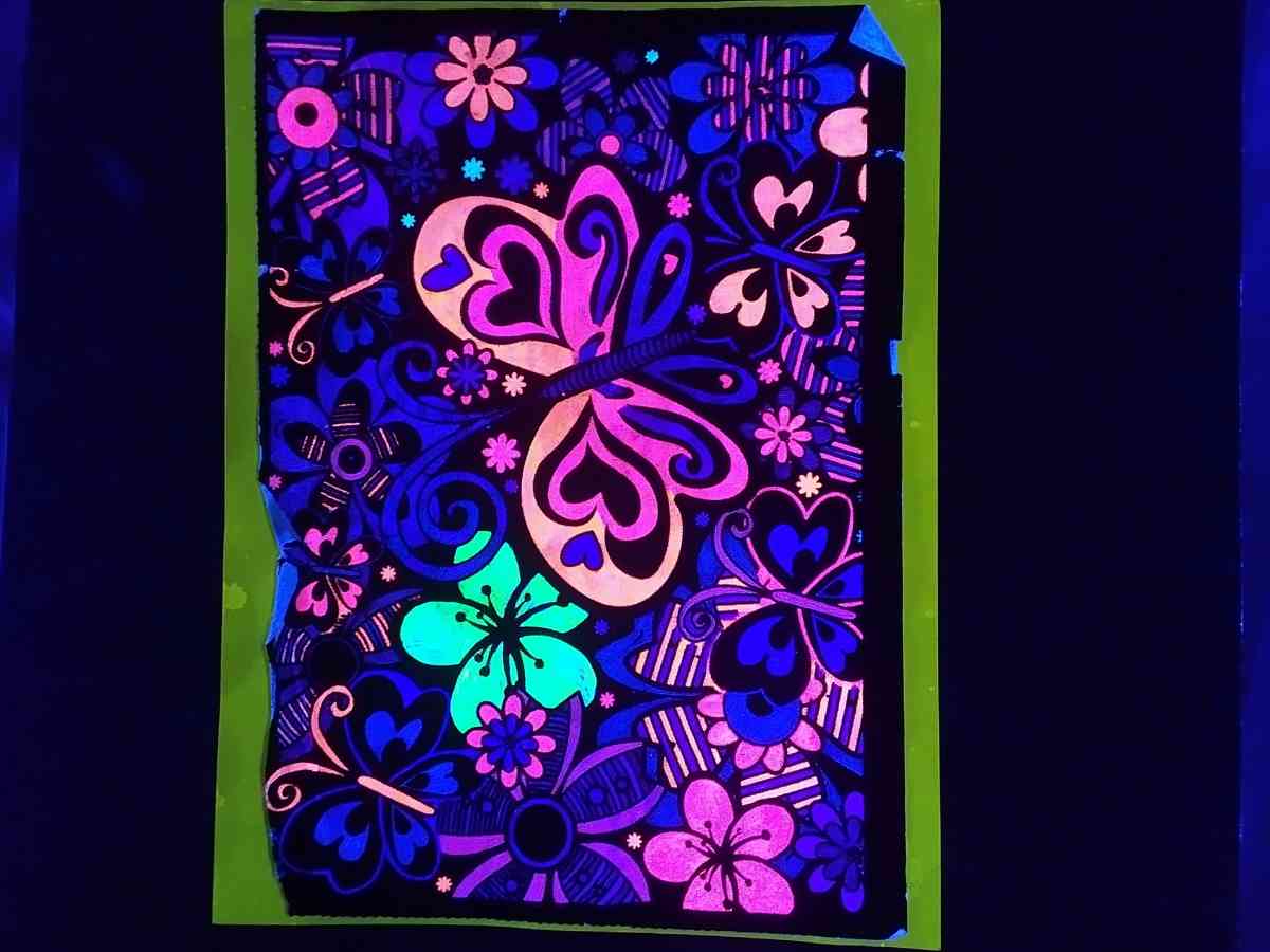 Hand made velvet posters that also glow in blacklight