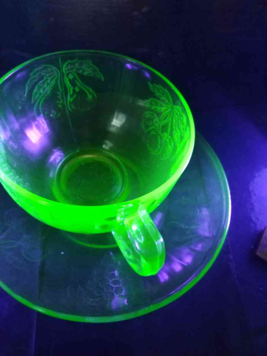 Hazel Atlas fruits uranium glass cup and saucer