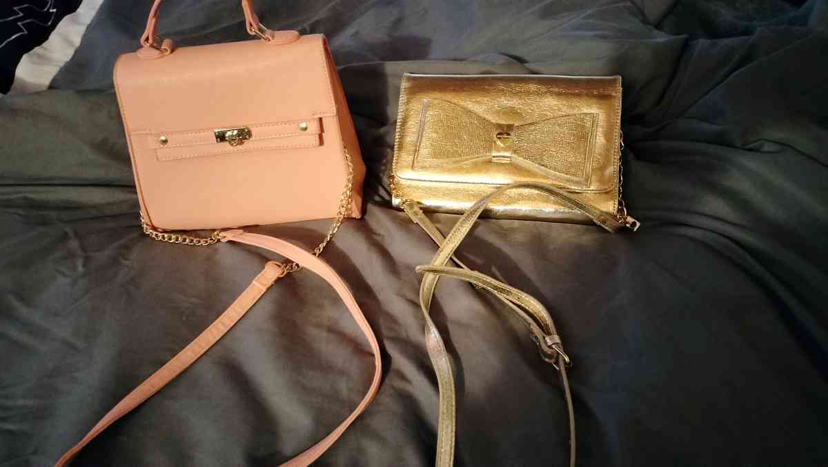 two hand bags iv never used selling both for 50 cash