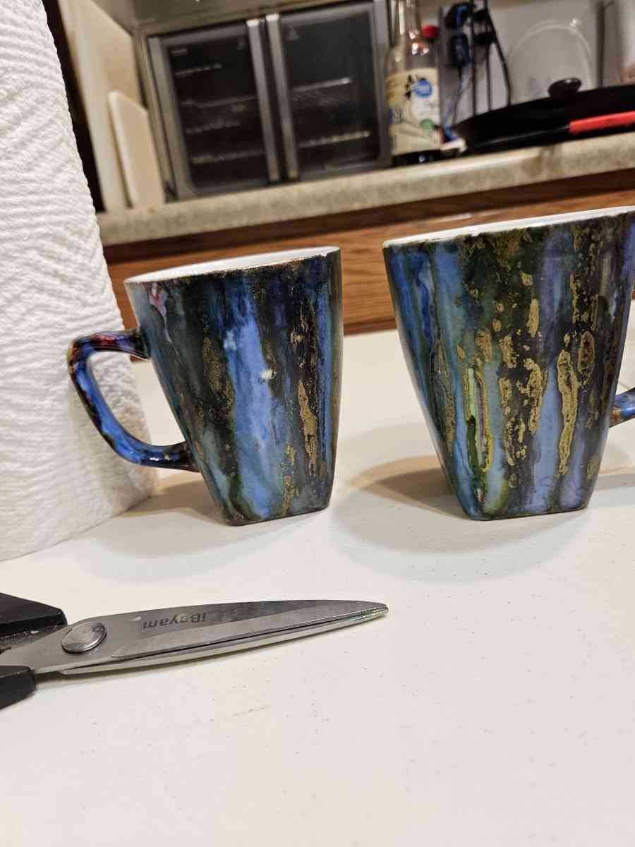 handpainted glass items and wood and stone sculptures