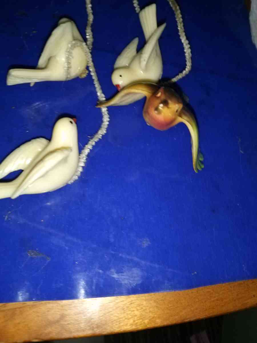 3 white and 1 airbrushed Lucite Birds