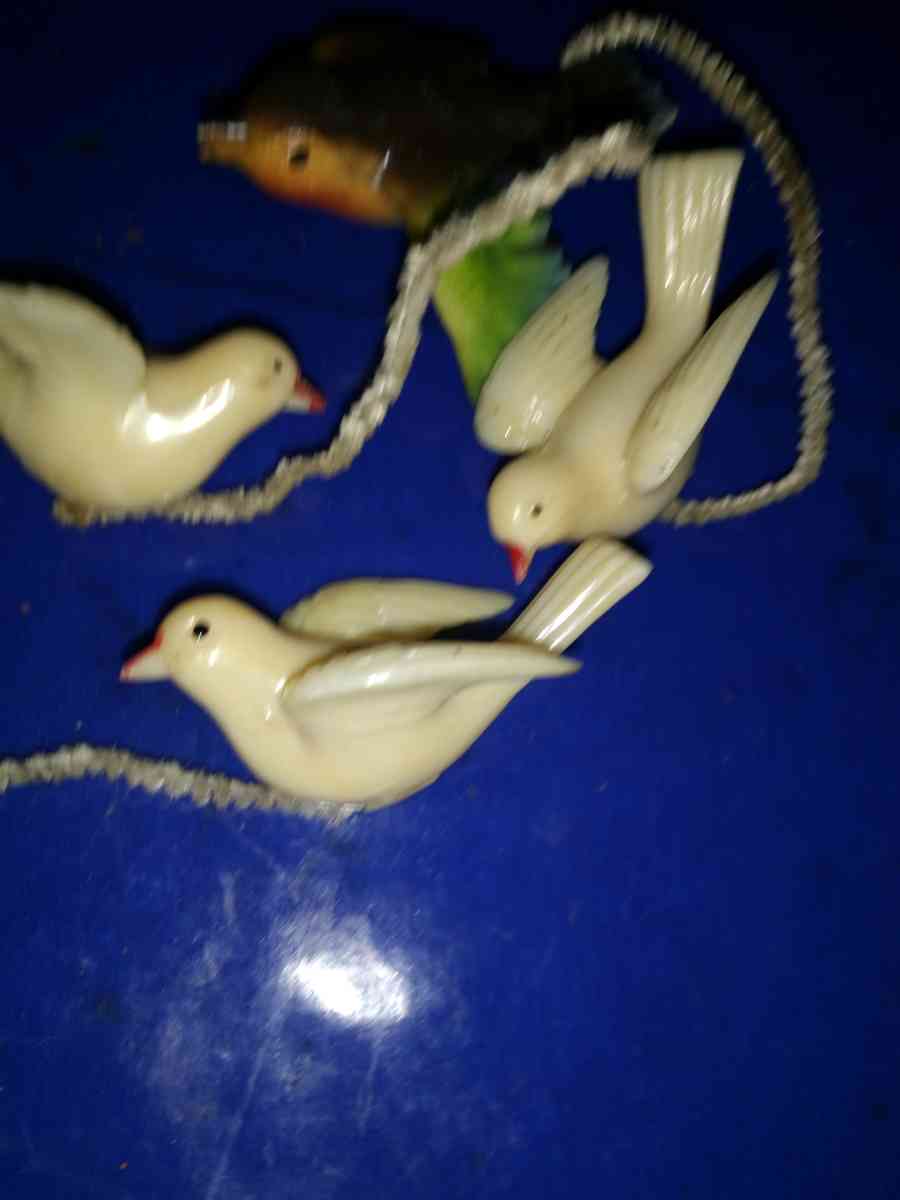 3 white and 1 airbrushed Lucite Birds