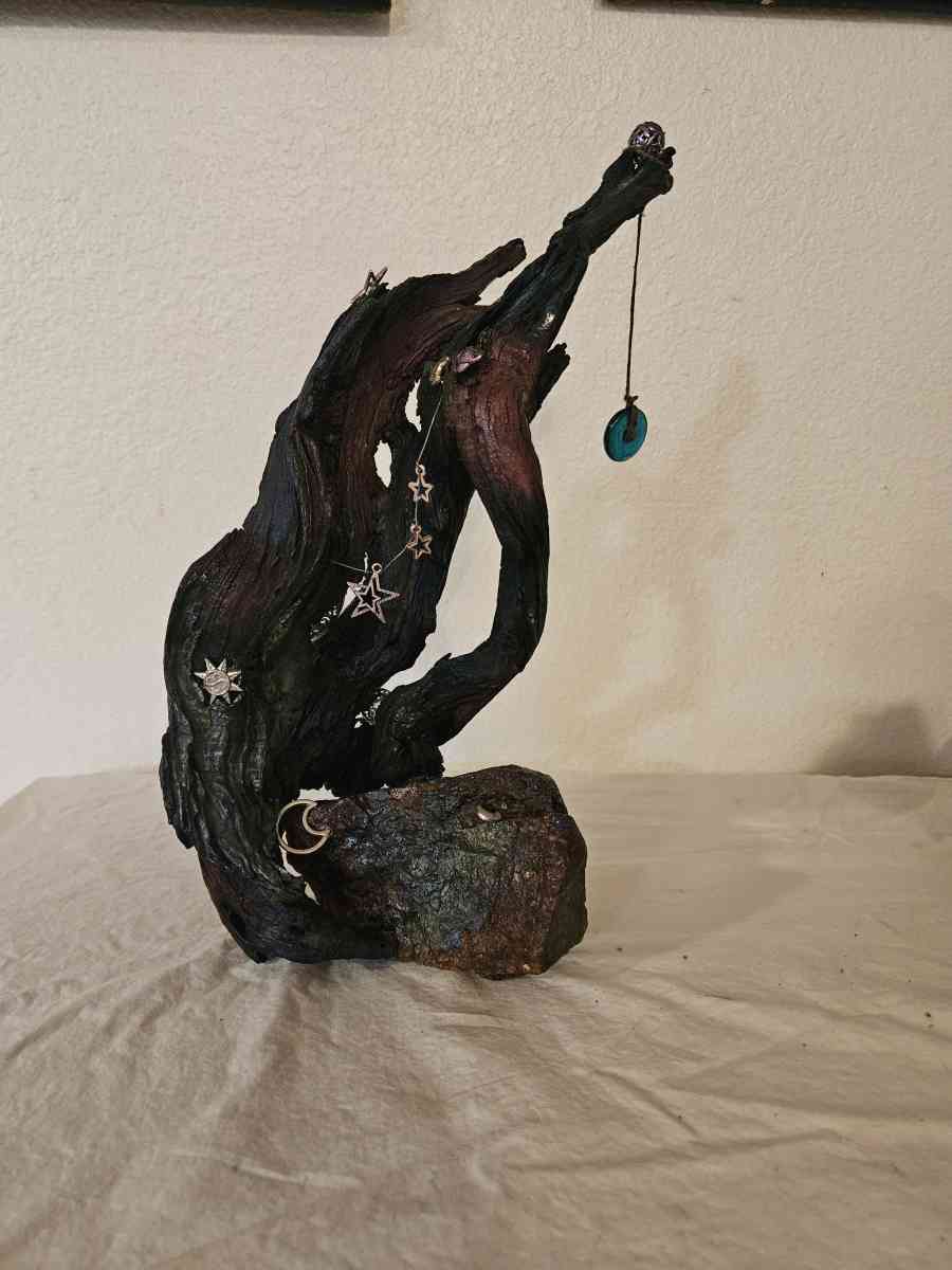 handpainted glass items and wood and stone sculptures