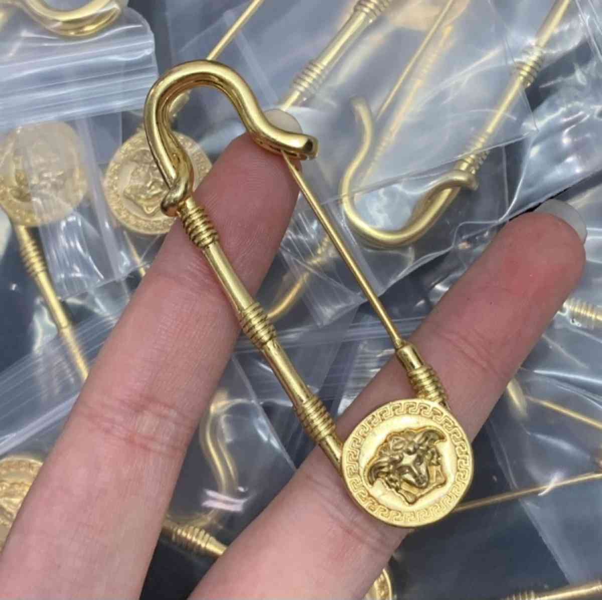 Versace brooch