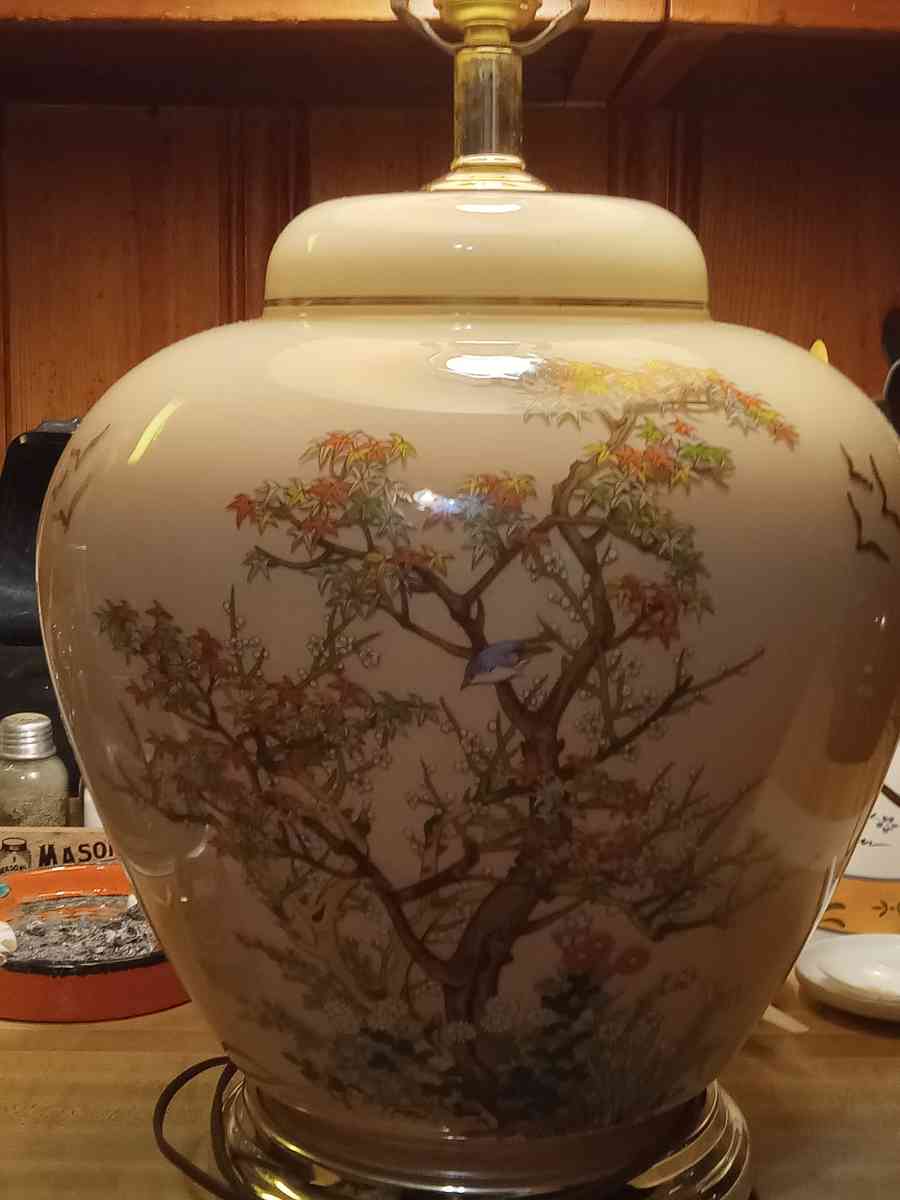 vintage decorative lamp with trees and birds on it