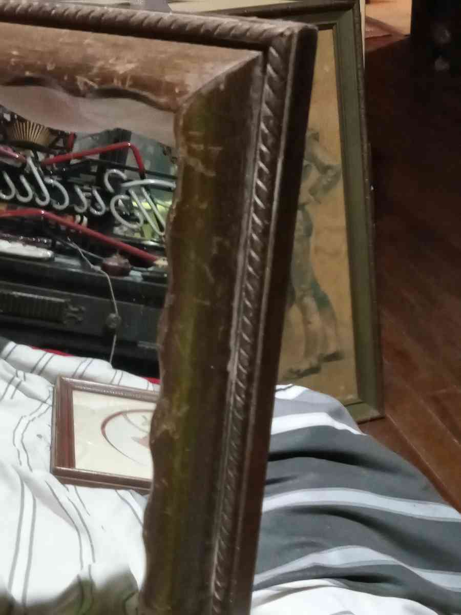 wood mirror ornate detailing