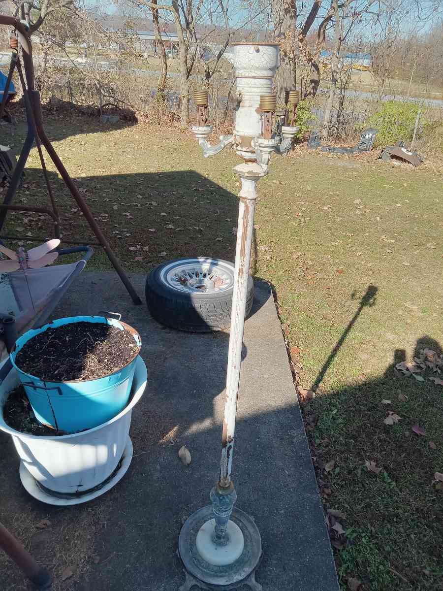 antique floor lamp marble base has brass on it