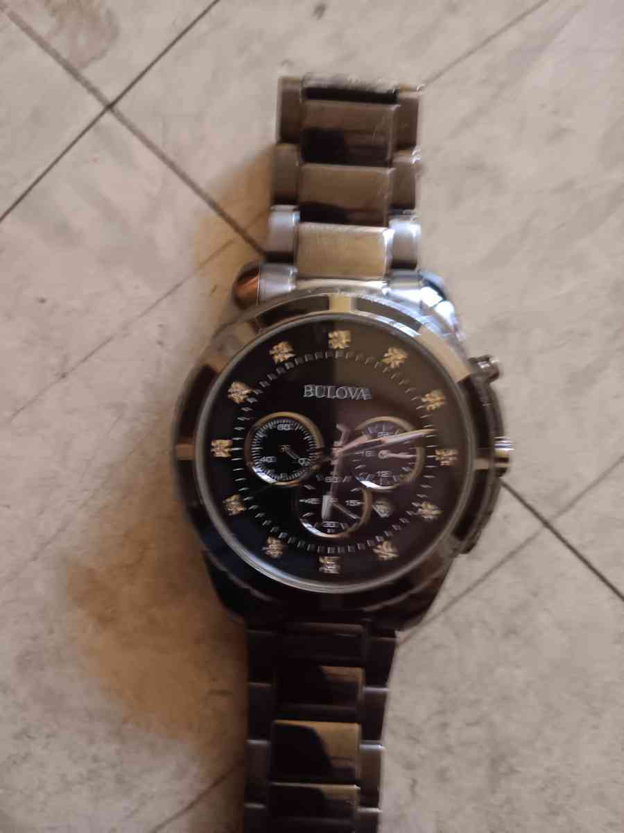 mens Bulova watch like new cost 499 new