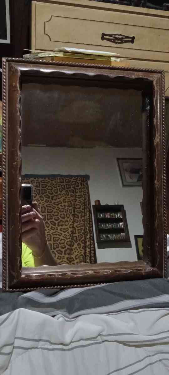 wood mirror ornate detailing