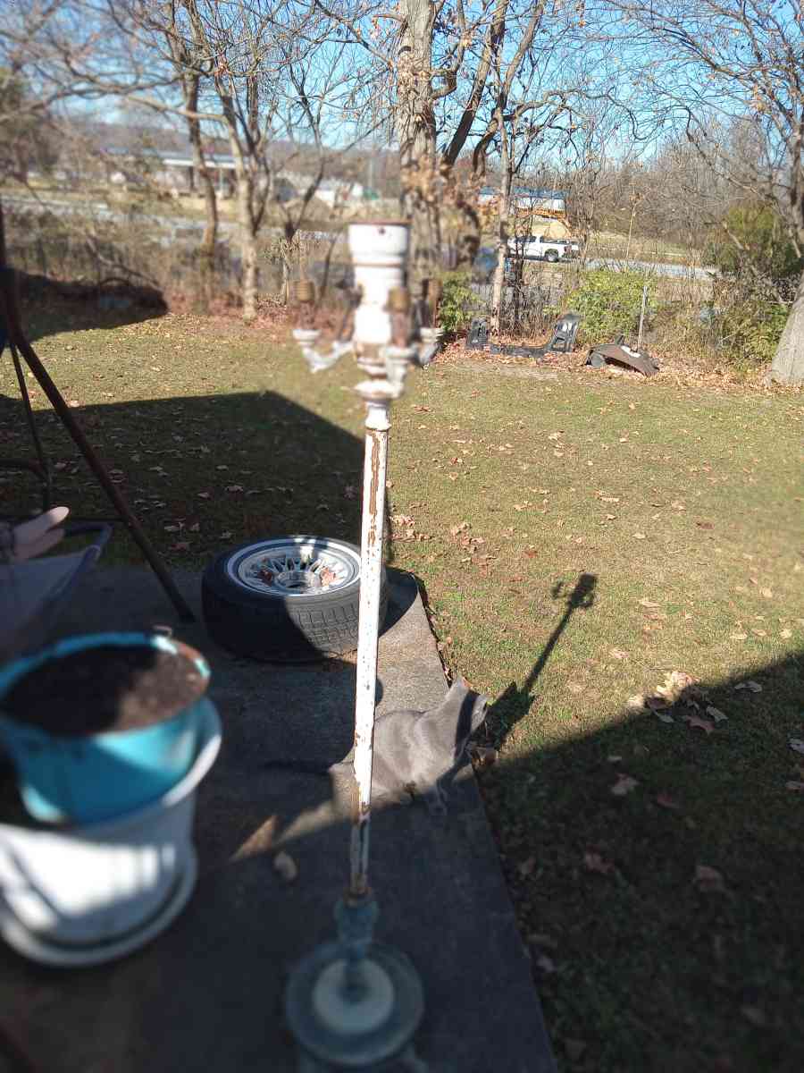 antique floor lamp marble base has brass on it