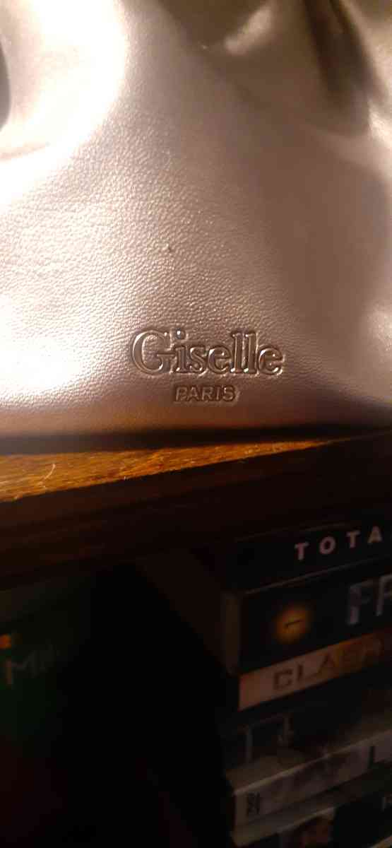 a genuine Giselle Paris purse