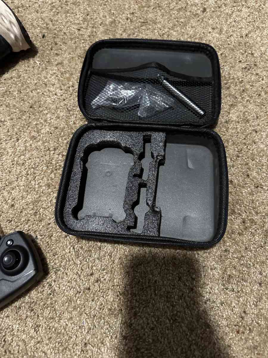 Tiny drone with camera and carry case