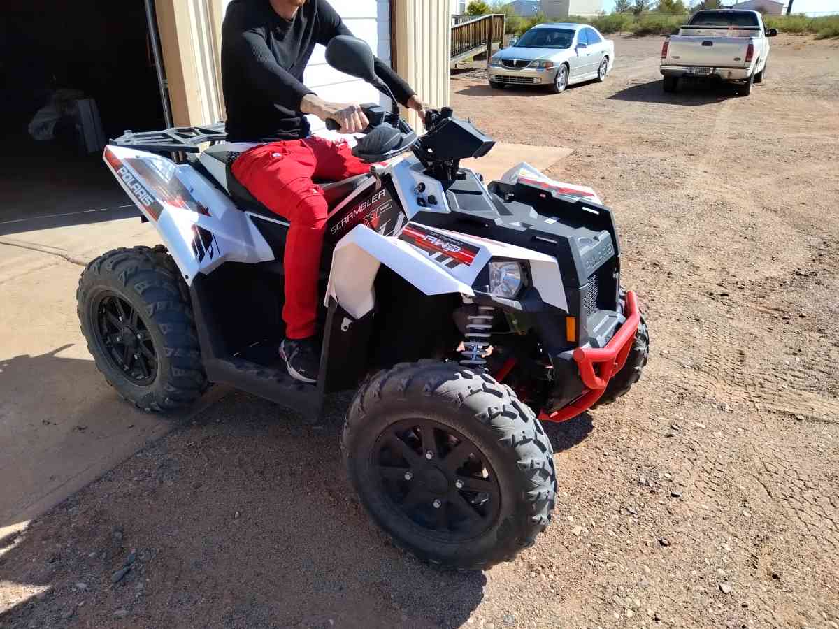 A 2016 Polaris On Demand All Wheel Drive Scrambler Xp 1000
