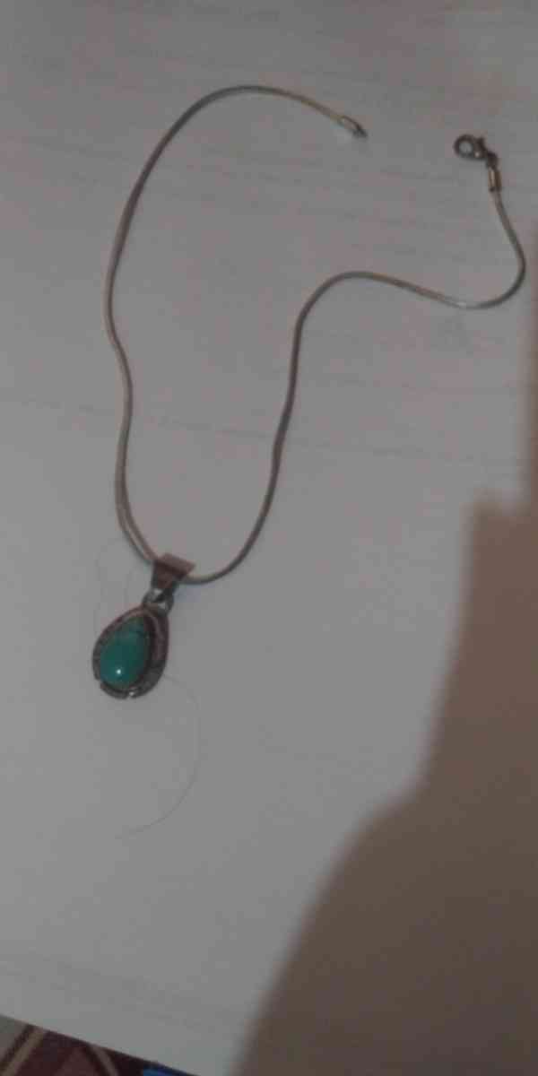 womens beautiful silver necklace throwing in pendant for fre