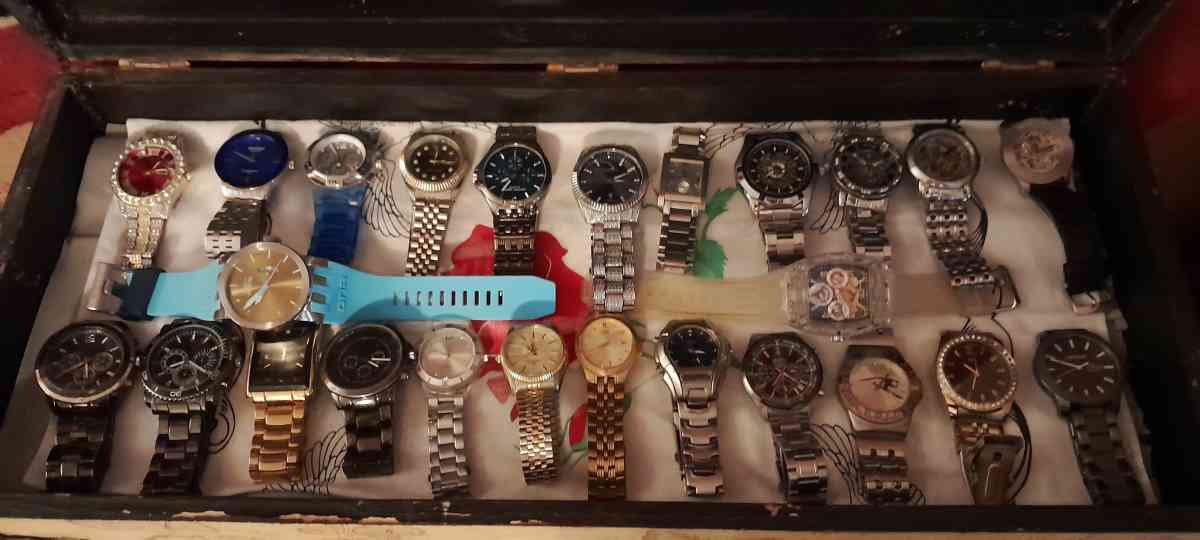 watch collection includes invicta guess Ellen Movado rolex