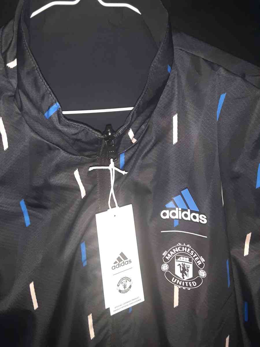 Manchester united jacket double side size xl