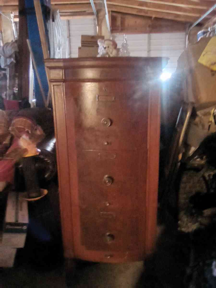 antique late 1800s tongue and groove file cabinet has 4 file