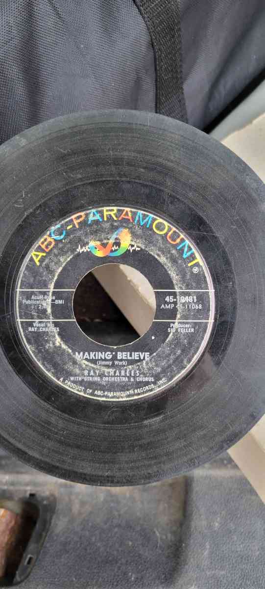 45 records Elvis Presley and Ray Charles