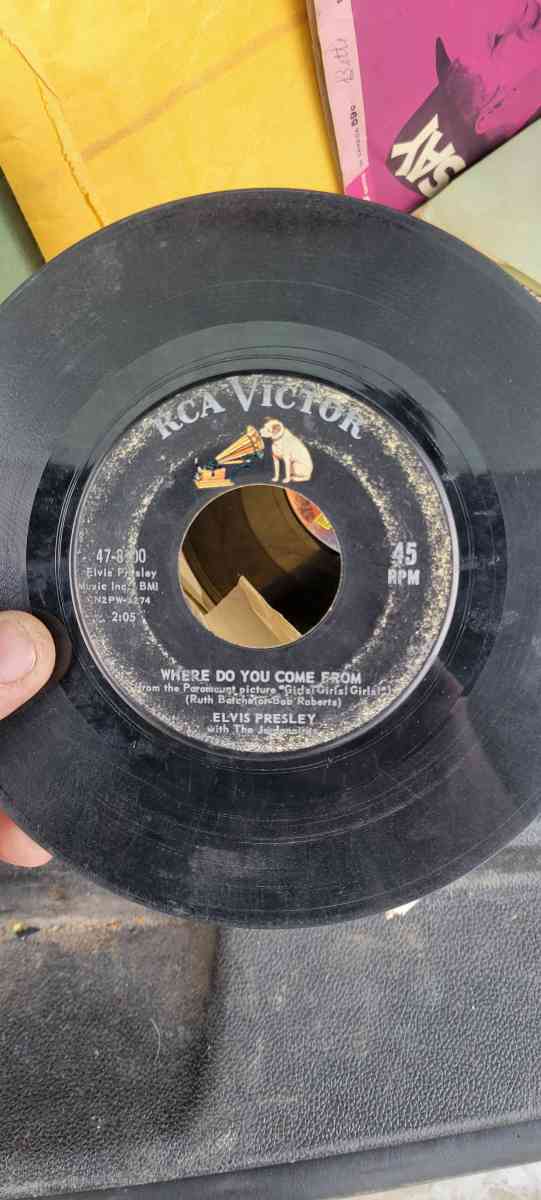 45 records Elvis Presley and Ray Charles