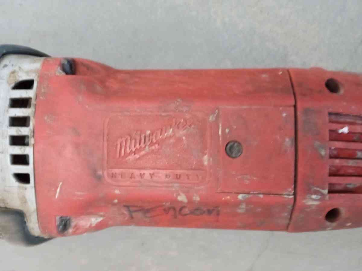 the Milwaukee heavy duty drill 12 perfect condition of work