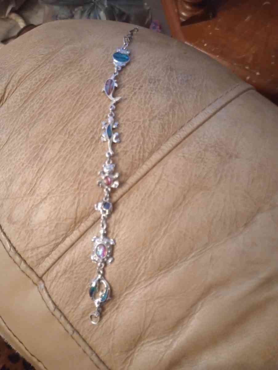 both bracelets one is like a goldfish and another one is lik