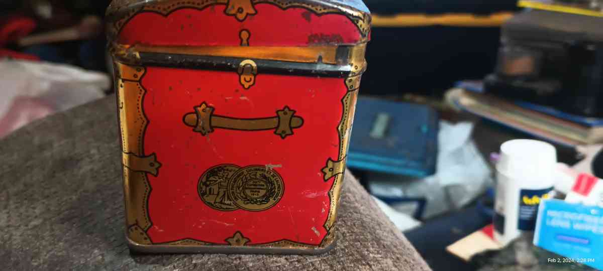 vintage tea tin used but clean readable