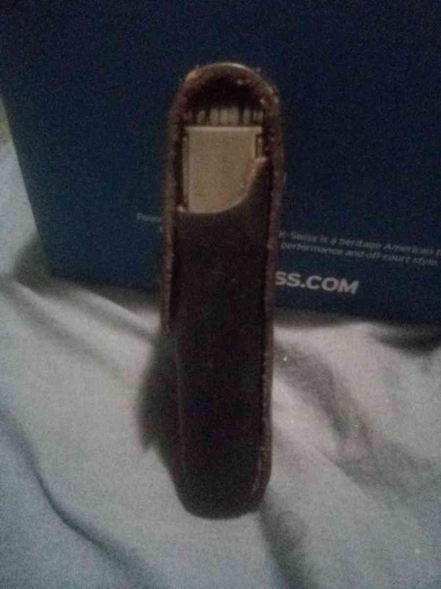 its Leatherman sporting knife with 19 tools its own case