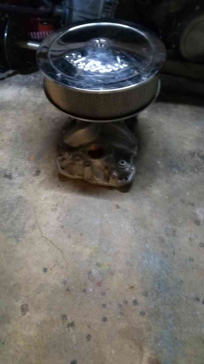 Edelbrock Carb 650 4 high Rise Intake and a 14 breather