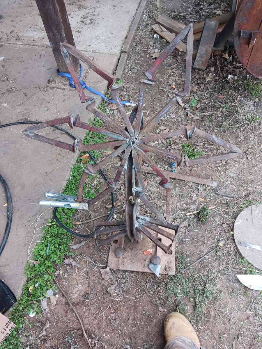 yard art flower made it out of train track spikes 65 for it