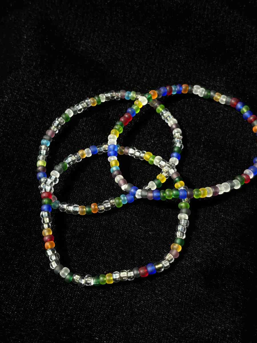 Set of 3 elastic rainbow and clear beaded bracelets