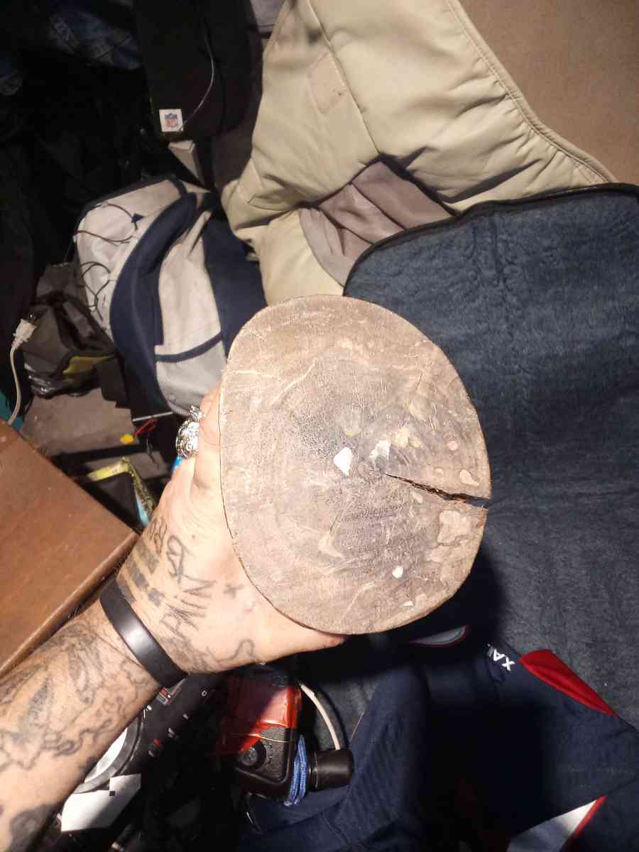 wood carving of a Roman firefighter