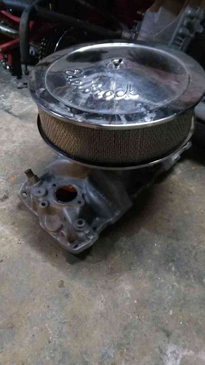 Edelbrock Carb 650 4 high Rise Intake and a 14 breather