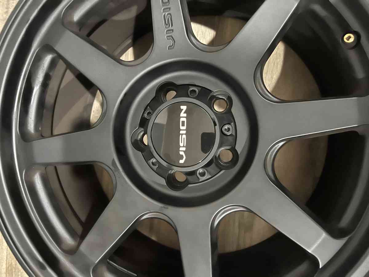 4 new identical matte black Vision rims