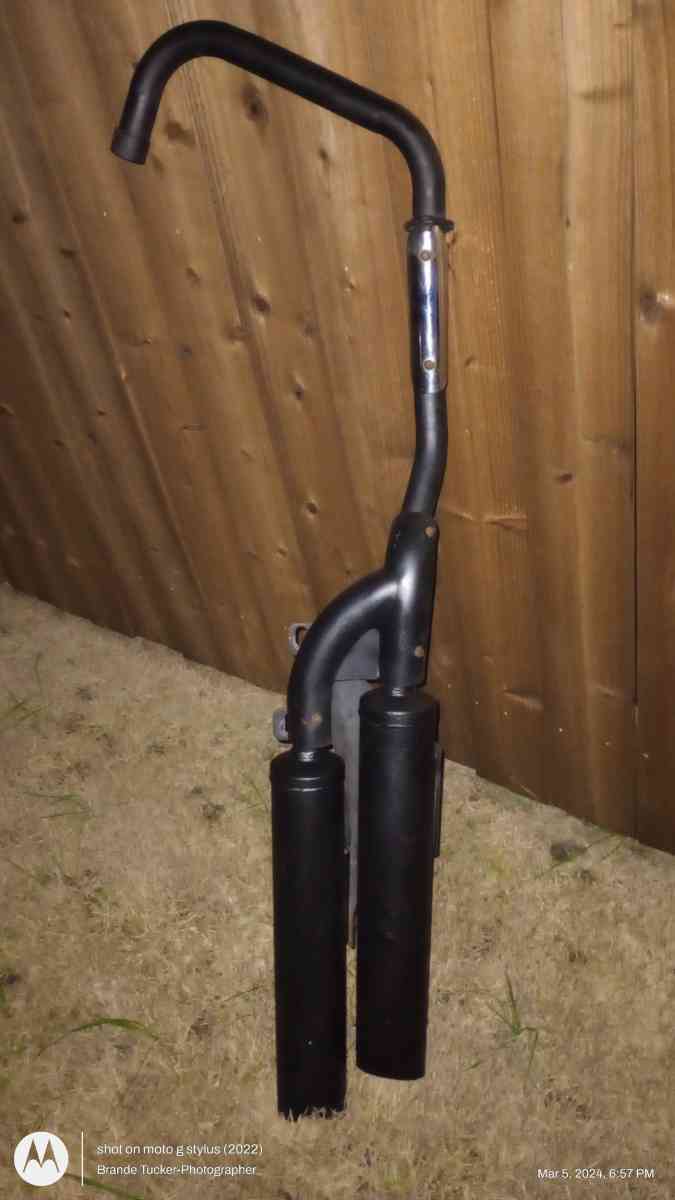 Black Straight Dual Exhaust for a motorcycle