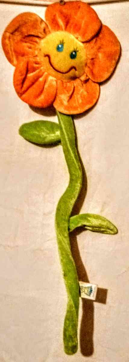 Orange Flower with Yellow Smiley Face and Green Bendable Ste