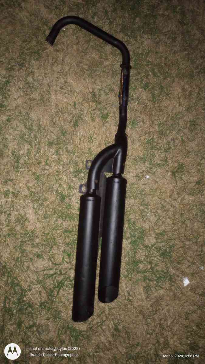 Black Straight Dual Exhaust for a motorcycle