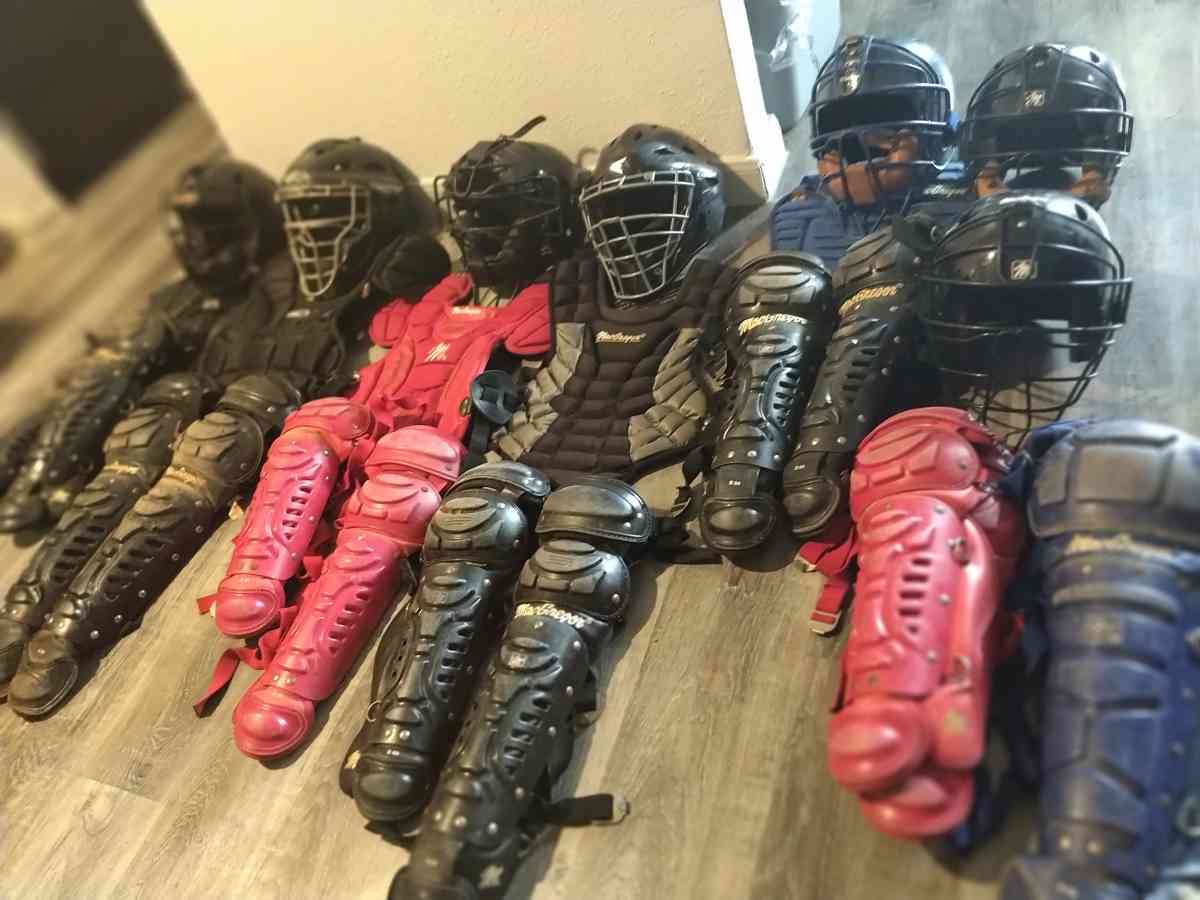 little League catcher gear baseball bats and helmets