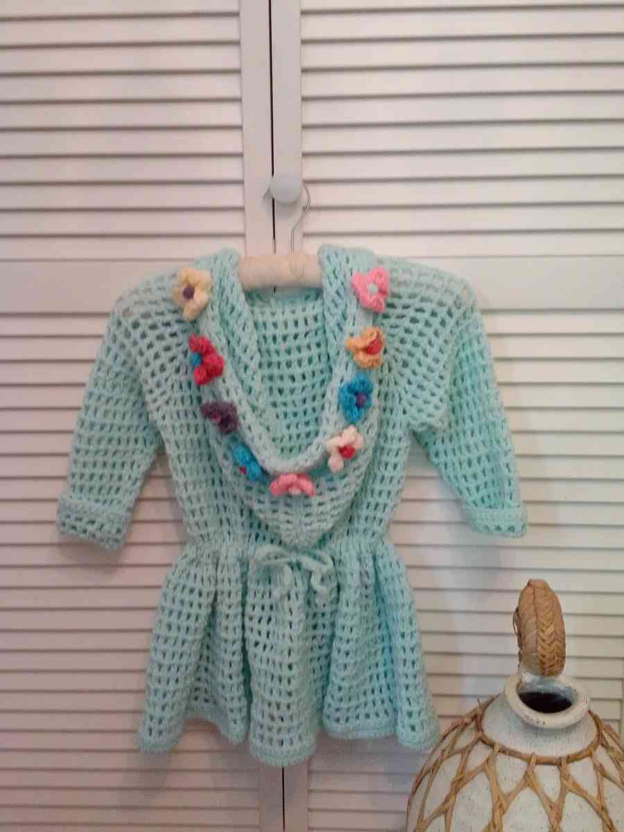 crocheted hoodie with puff flowers and heart wood buttons