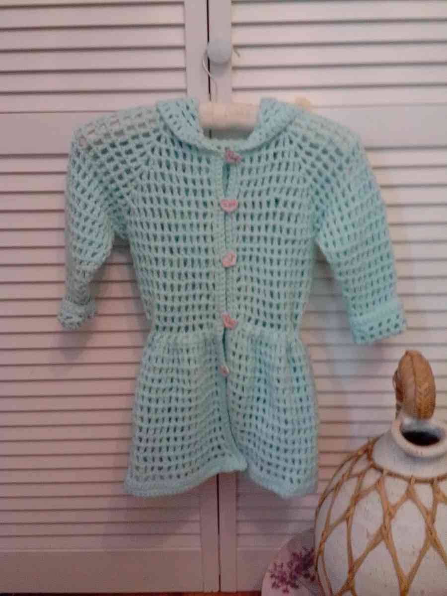 crocheted hoodie with puff flowers and heart wood buttons