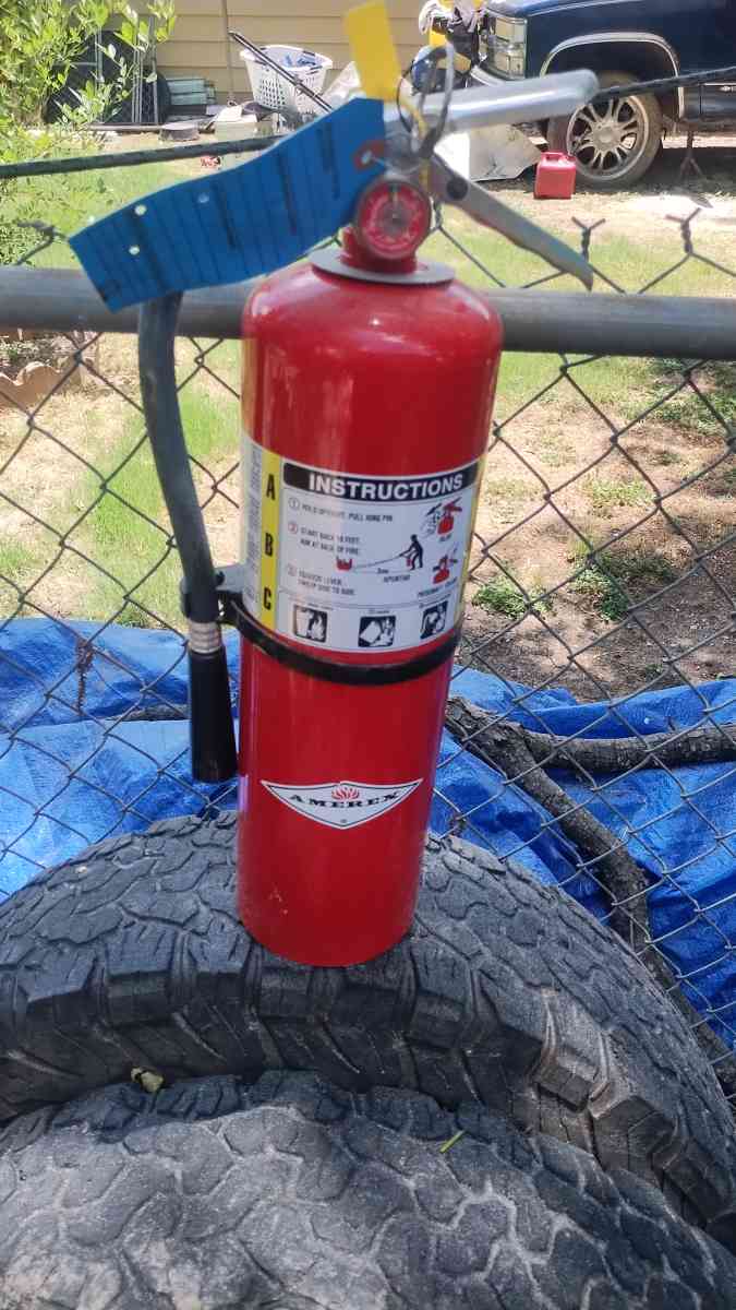 large full brand new fire extinguisher