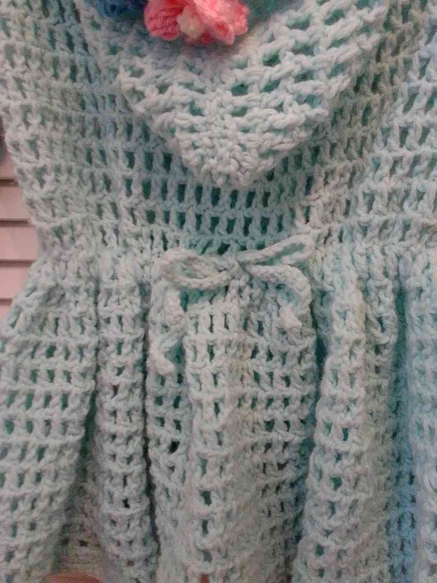 crocheted hoodie with puff flowers and heart wood buttons