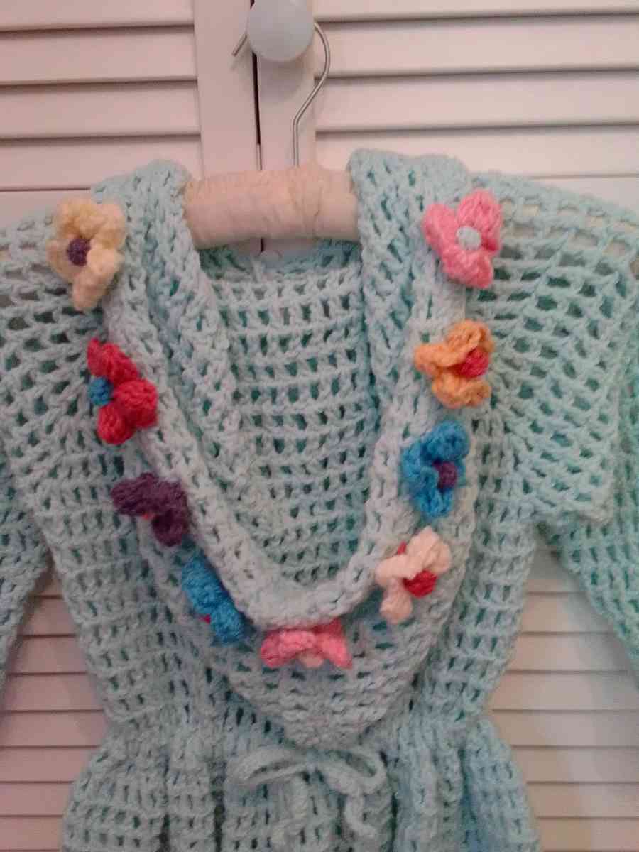 crocheted hoodie with puff flowers and heart wood buttons