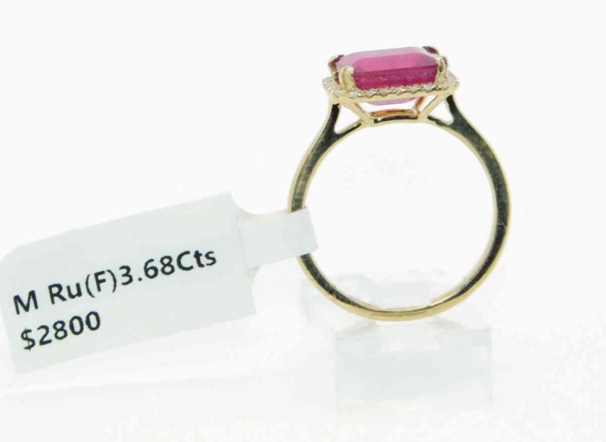 14k Gold Rudy  and diamonds   ring