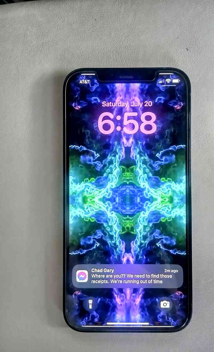 Black iPhone 12 With Black OtterBox Case