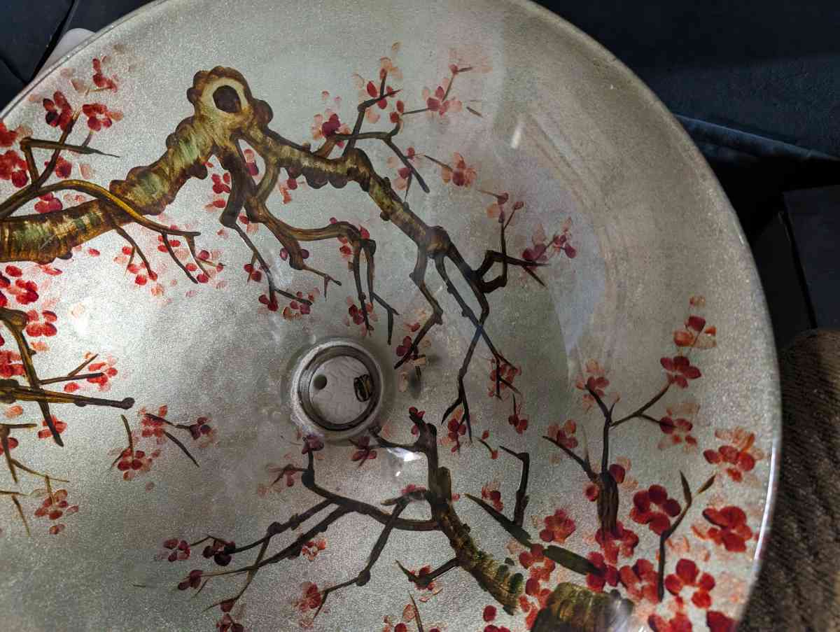 Vanity sink with a rose vine design