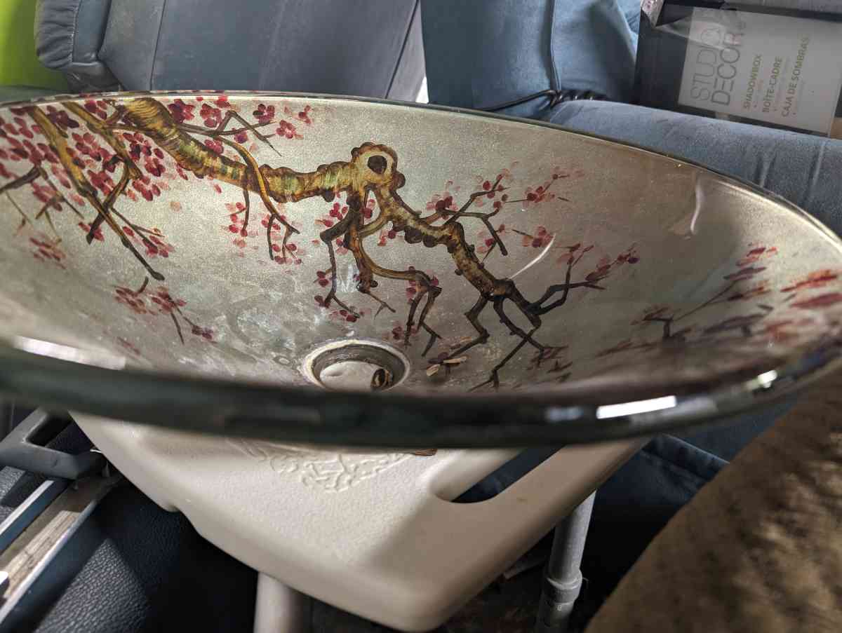 Vanity sink with a rose vine design