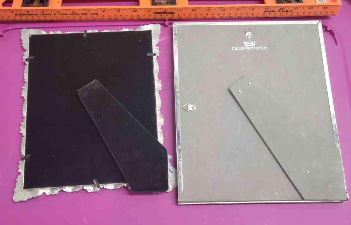 2  8x10 Photo Frames 1 Pearl and Embellished 1 Silver Mirror