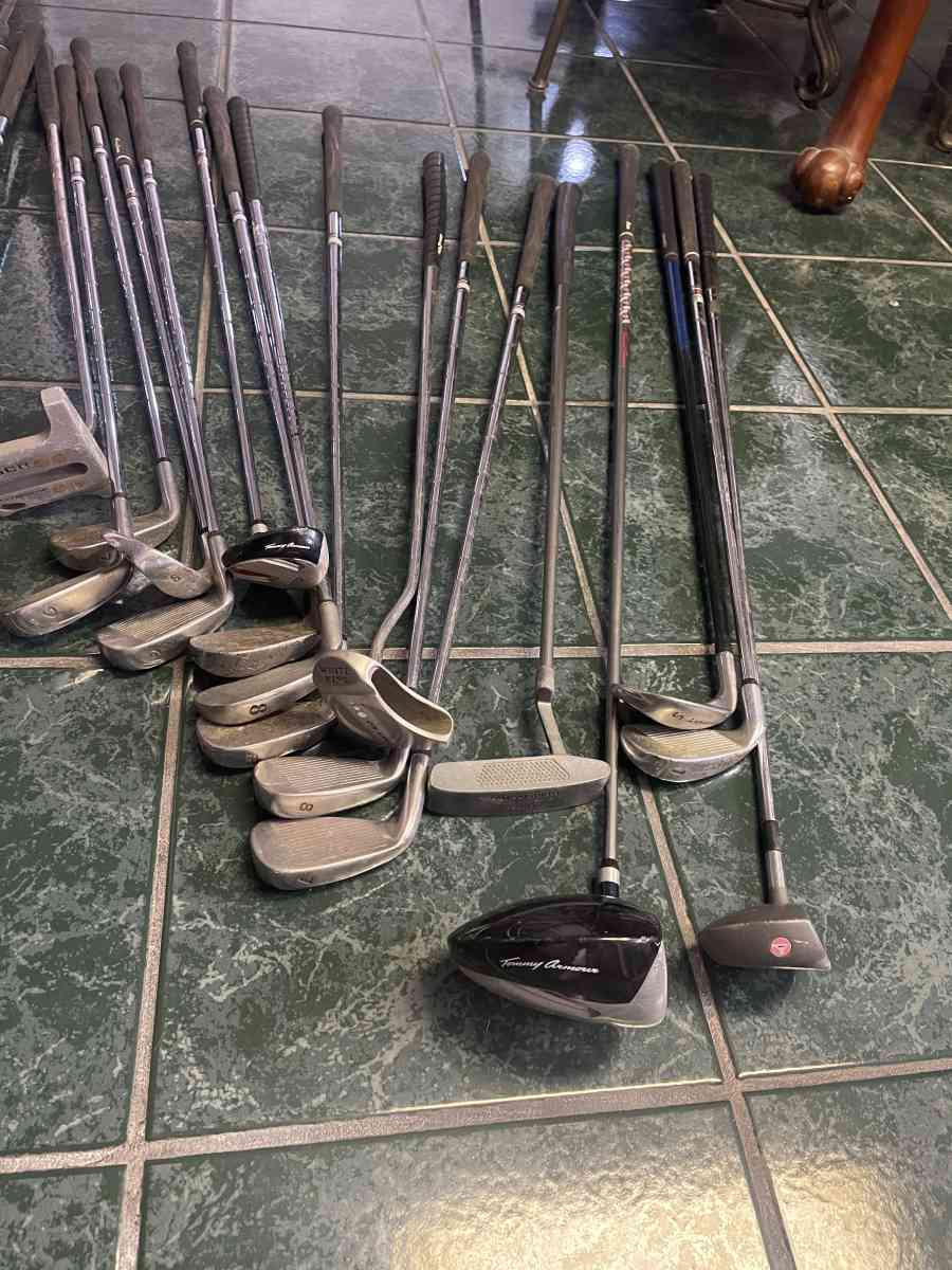 huge lot of golf clubs
