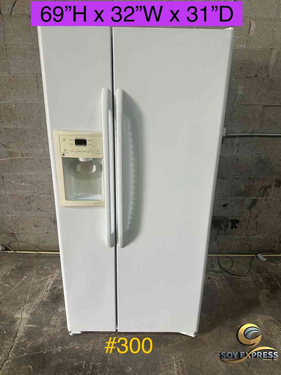 GE refrigerator side by side with ice and water dispenser